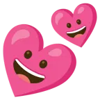 grinning face + two hearts