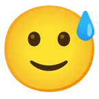 faccina con sorriso e goccia di sudore + faccina con sorriso accennato