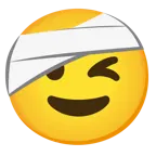 winking face + face with head-bandage