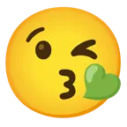 face blowing a kiss + green heart
