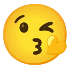 face blowing a kiss + yellow heart
