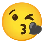 face blowing a kiss + black heart