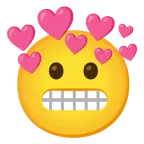 faccina con smorfia + cuore con freccia