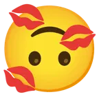 upside-down face + kiss mark