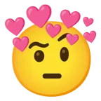 faccina con sopracciglia alzate + cuore con freccia