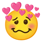 faccina stordita + cuore con freccia