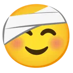 smiling face + face with head-bandage