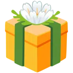 Geschenk + gelbe Blüte
