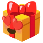 Geschenk + lächelndes Gesicht mit herzförmigen Augen