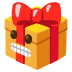Geschenk + Grimassen schneidendes Gesicht