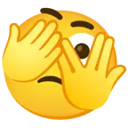 faccina che sbircia tra le dita + faccina concentrata
