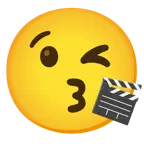 face blowing a kiss + clapper board
