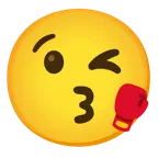 face blowing a kiss + boxing glove