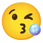 face blowing a kiss + mirror ball