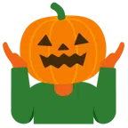 persona che scrolla le spalle + zucca di Halloween