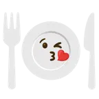 face blowing a kiss + fork and knife with plate