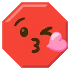 face blowing a kiss + stop sign