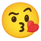 face blowing a kiss + face with raised eyebrow