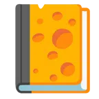 Bücherstapel + Käsestück