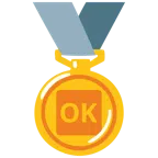 Goldmedaille + Großbuchstaben OK in blauem Quadrat