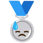 Silbermedaille + bedrücktes Gesicht mit Schweiß