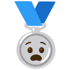 Silbermedaille + qualvolles Gesicht