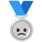 Silbermedaille + betrübtes Gesicht