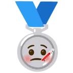 Silbermedaille + Gesicht mit Fieberthermometer