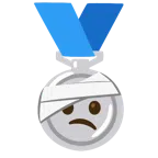 Silbermedaille + Gesicht mit Kopfverband