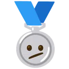 Silbermedaille + Gesicht mit schrägem Mund