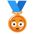 Bronzemedaille + errötetes Gesicht mit großen Augen