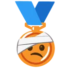 Bronzemedaille + Gesicht mit Kopfverband