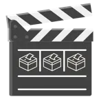Filmklappe + Urne mit Wahlzettel