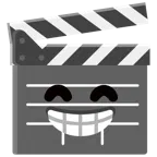 film tahtası + gülen gözlerle sırıtma