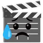 film tahtası + üzgün ama rahatlamış yüz