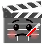 film tahtası + ağzında termometre olan yüz