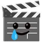 film tahtası + gözü yaşlı gülümseyen yüz