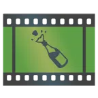 taśma filmowa + butelka z wystrzelającym korkiem