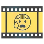 Filmstreifen + besorgtes Gesicht mit Schweißtropfen
