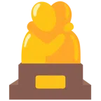 Pokal + sich umarmende Personen