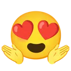 persona che scrolla le spalle + faccina con sorriso e occhi a cuore
