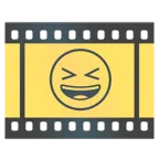 Filmstreifen + Grinsegesicht mit zugekniffenen Augen