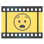Filmstreifen + qualvolles Gesicht