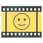 Filmstreifen + leicht lächelndes Gesicht