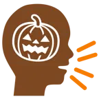 persona che parla + zucca di Halloween